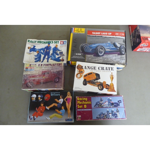 323 - 1/24 scale model kits: to include by Revell, a 'Ferrari F310B'; and a 'Hawker Hurricane Mk.I' by Air... 