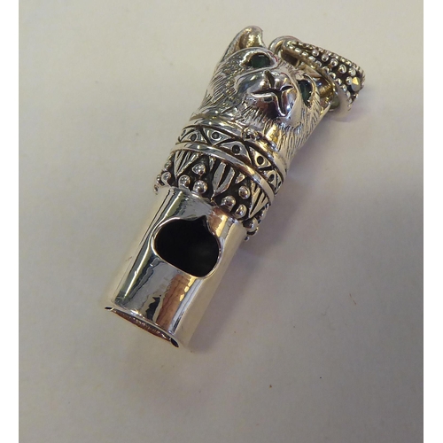 325 - A silver novelty pendant whistle, fashioned as a cat's head