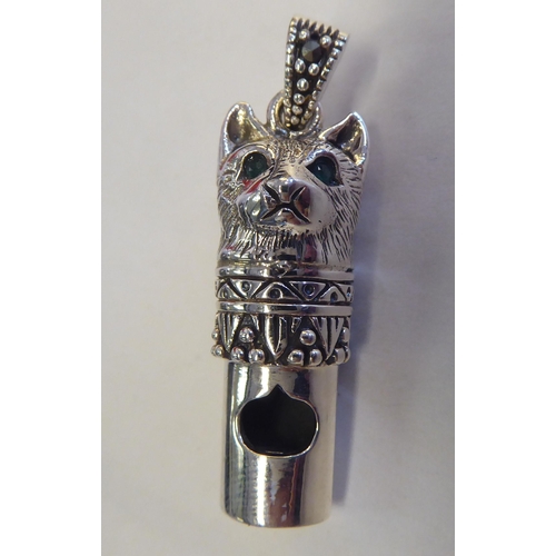 325 - A silver novelty pendant whistle, fashioned as a cat's head