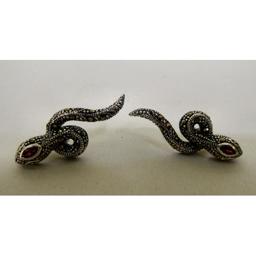 327 - A pair of silver coloured metal and marcasite snake earrings