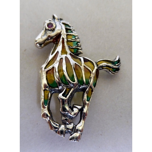 328 - A silver coloured metal and plique a jour set, seahorse brooch