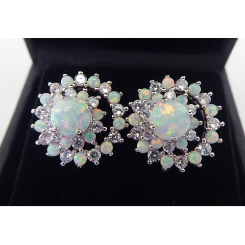 337 - A pair of silver coloured metal, cubic zirconia and opal set earrings