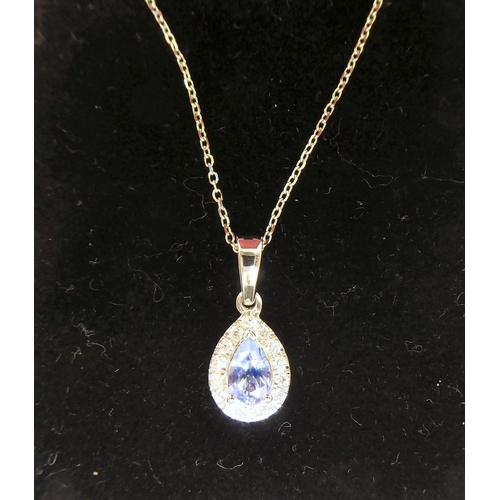 342 - An 18ct gold pear shape, sapphire and diamond set pendant, on a fine neckchain