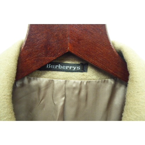 354 - Gentlemans fashion: to include two Burberry jackets, one in tan, the other navy  approx. size 48/XXL... 