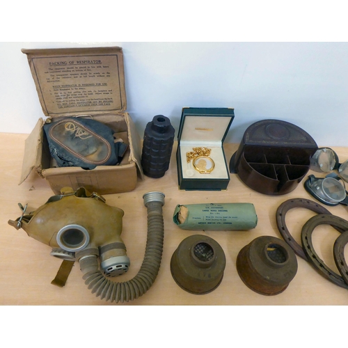 362 - Military related collectables: to include a child's gas mask and goggles (Please Note: this lot is s... 