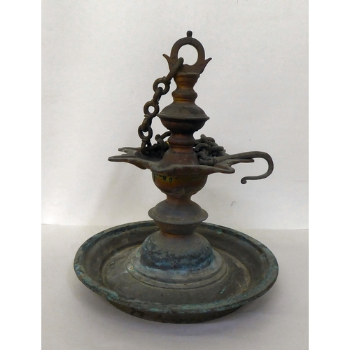 368 - A cast metal hanging oil lamp of Indian design  12.5