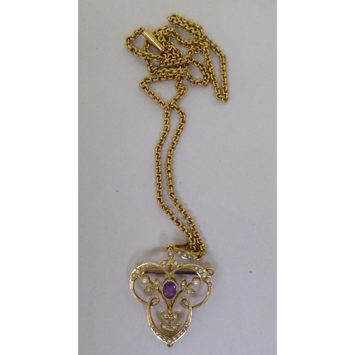 369 - A late Victorian 15ct gold pendant, set with pearls, on a yellow metal chain 