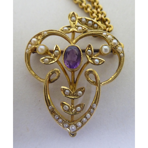 369 - A late Victorian 15ct gold pendant, set with pearls, on a yellow metal chain 