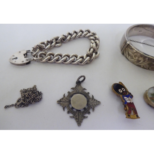 380 - Mainly silver and other items of personal ornament: to include a chunky bracelet, on a heart shape c... 