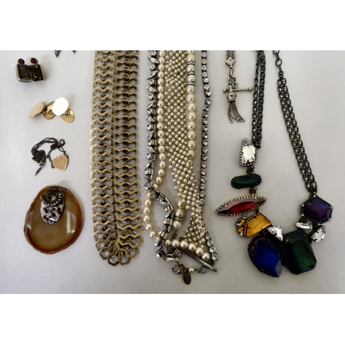 389 - Costume jewellery: to include a necklace, set with eight coloured faux precious stones 