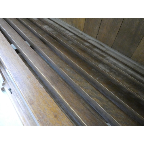 396 - A modern teak bookcase with three shelves and two drawers, on a plinth  76