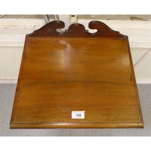 398 - A late Victorian walnut pot cupboard with a door, on a plinth  29