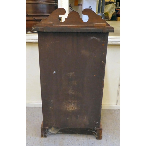 398 - A late Victorian walnut pot cupboard with a door, on a plinth  29