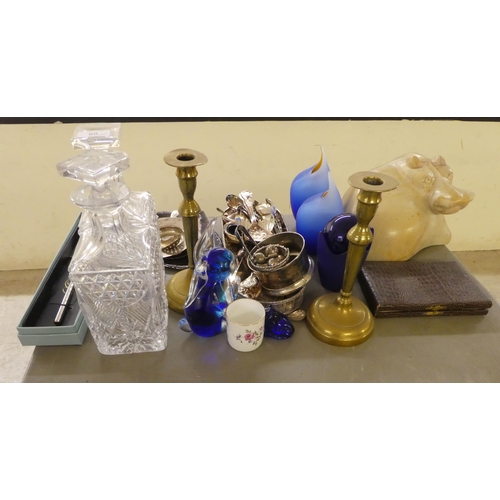 60 - A mixed lot: to include a pair of glass decanters; and various metalware