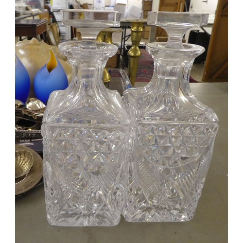 60 - A mixed lot: to include a pair of glass decanters; and various metalware