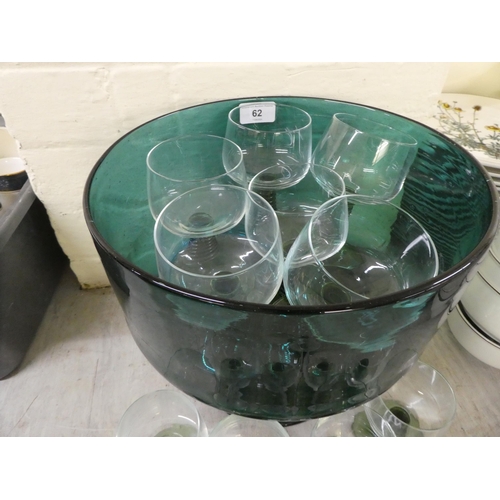 62 - Glassware: to include a green glass pedestal punch bowl with six pedestal glasses