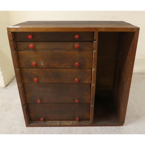 7 - An early 20thC teak tool cabinet  19