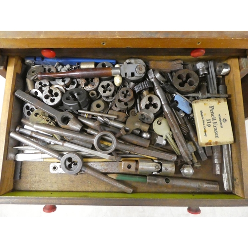 7 - An early 20thC teak tool cabinet  19