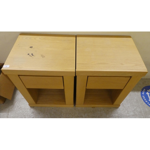 75 - A pair of John Lewis light oak single drawer bedside chests, on a plinth  24