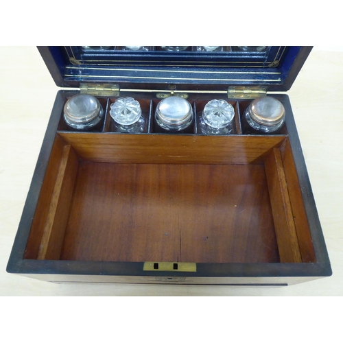 272 - A late Victorian walnut vanity box with straight sides and a hinged lid, enclosing a fitted interior... 