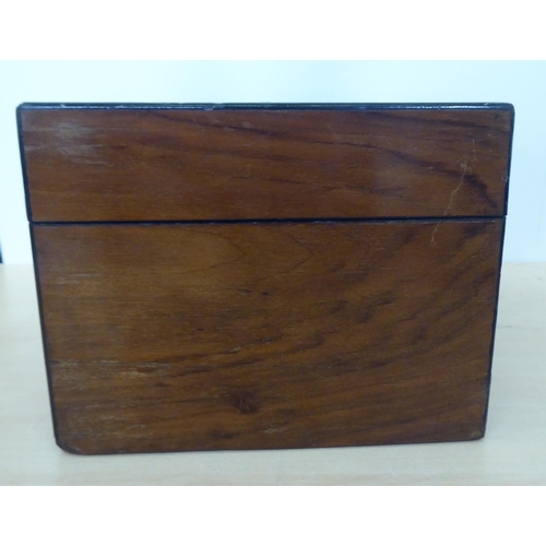 272 - A late Victorian walnut vanity box with straight sides and a hinged lid, enclosing a fitted interior... 