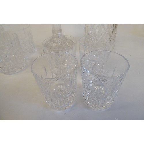 99 - Waterford Crystal Lismore pattern viz; two decanters and two sets of four tumblers