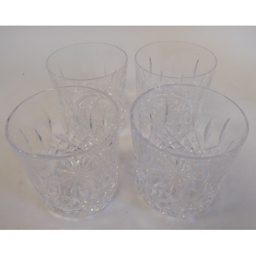 99 - Waterford Crystal Lismore pattern viz; two decanters and two sets of four tumblers