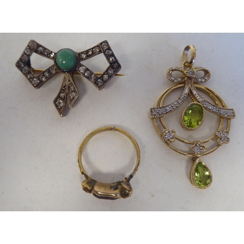 114 - Jewellery: to include a ring and two brooches set with various stones  mixed marks 