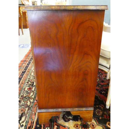 14 - A modern Georgian design mahogany and burr walnut, five drawer dressing chest, raised on bracket fee... 