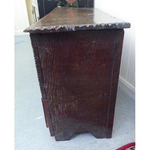 17 - A mid 18thC oak mule chest with two base drawers  24