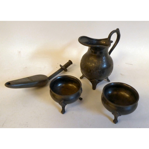 184 - Early 20thC and later collectables: to include small copper jelly moulds; a silver plated table crue... 