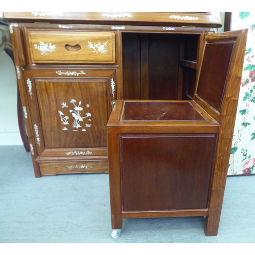 19 - A modern Chinese mother-of-pearl inlaid rosewood home office desk, the fall flap, over two drawers a... 