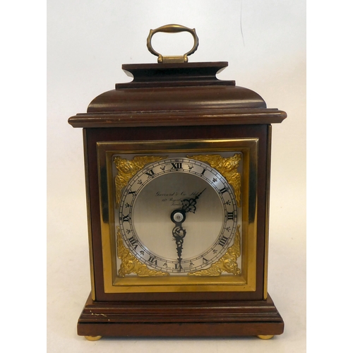 222 - A 20thC Garrard & Co mantel timepiece, in a gilt metal mounted, simulated mahogany case; the Ell... 