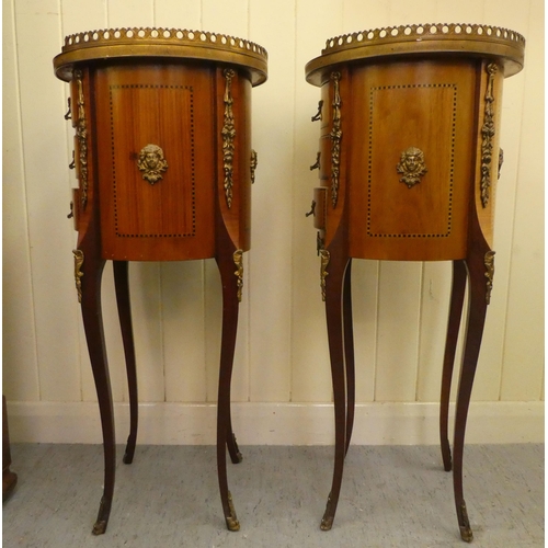 24 - A pair of modern Louis XVI design, marquetry and ormolu mounted, three drawer side tables of cylinde... 