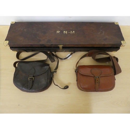 343 - An early 20thC hide bound shotgun case; and two contemporary ammunition satchels