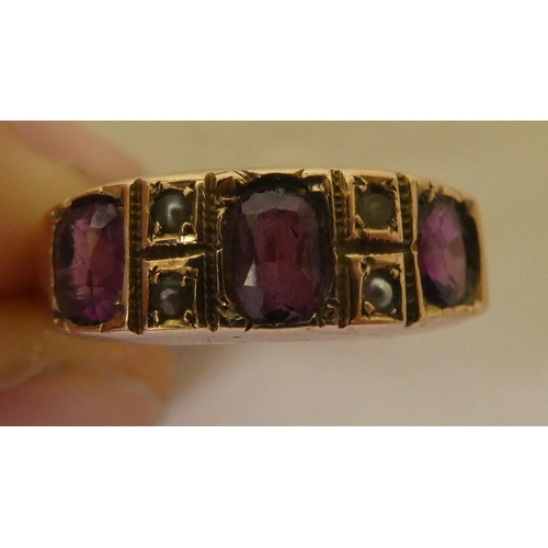 354 - A 9ct gold ring, set with purple stones and pearls