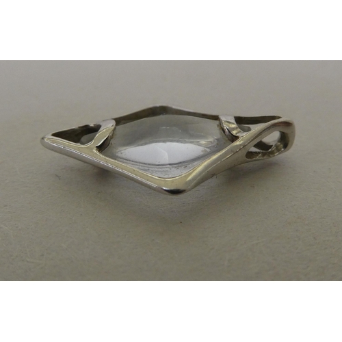 358 - A white metal pendant (probably 9ct gold), set with a marquise cut quartz