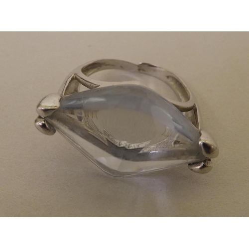 364 - A white metal (probably 9ct gold) ring, set with a marquise cut quartz