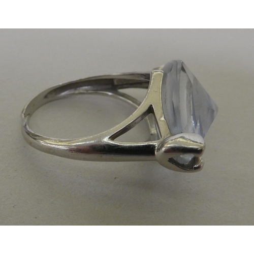 364 - A white metal (probably 9ct gold) ring, set with a marquise cut quartz