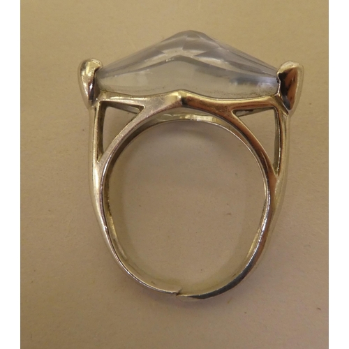 364 - A white metal (probably 9ct gold) ring, set with a marquise cut quartz