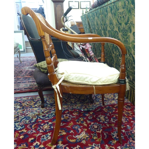 38 - A modern Regency design mahogany, overpainted open arm chair with a caned panel back and similar sea... 