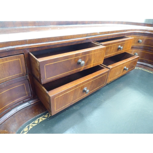 43 - A modern Carlton House design mahogany finished desk, raised on square, tapered legs  38