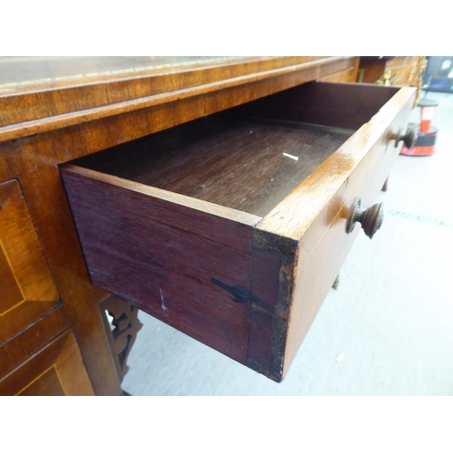 43 - A modern Carlton House design mahogany finished desk, raised on square, tapered legs  38