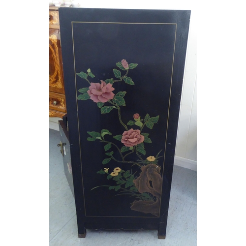 47 - A modern Chinese lacquered and overpainted, four door cabinet, raised on square legs  48