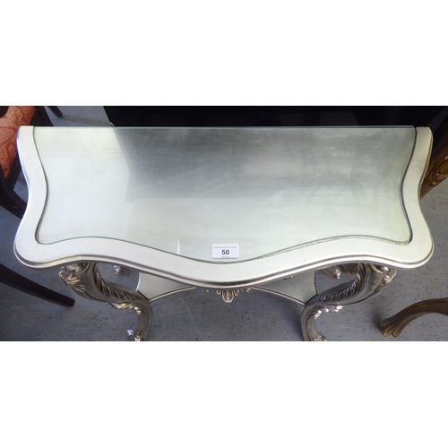 50 - A modern silver painted, serpentine front console table, raised on cabriole legs  29