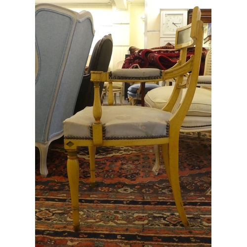 54 - A modern Regency design cream and floral painted arm chair, raised on turned legs