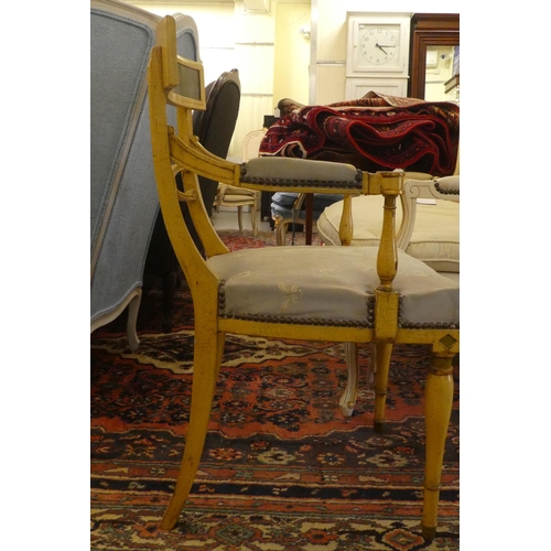 54 - A modern Regency design cream and floral painted arm chair, raised on turned legs