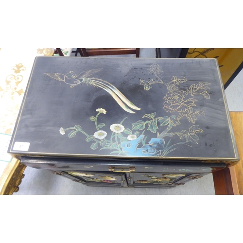 57 - A modern Chinese black lacquered, painted and hardstone inlaid Chinese cabinet, decorated with birds... 