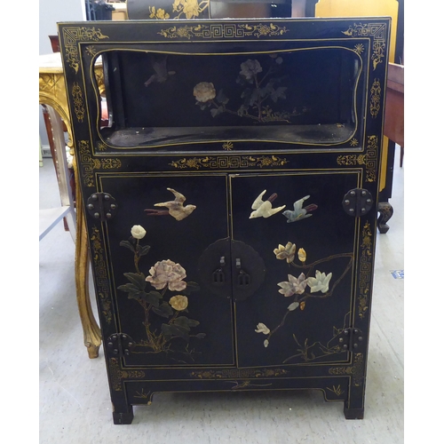 62 - A modern Chinese black lacquered, painted and hardstone inlaid cabinet  comprising an open shelf, ov... 