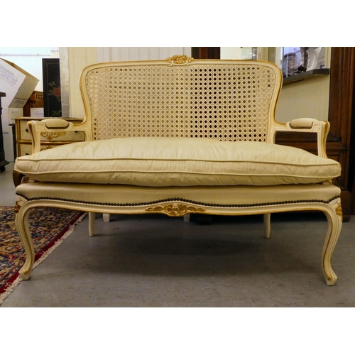 64 - A modern cream and gilt painted two person salon settee, raised on cabriole legs  49